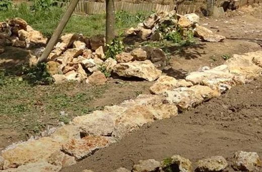 Monter un muret en pierre maçonnées